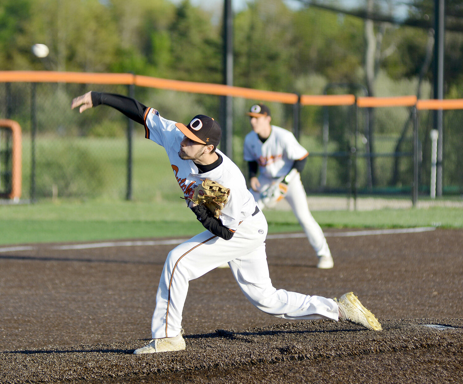 JJ Brown (center) delivers one of his 73 pitches for Owensville’s Dutchmen during senior-night baseball action last Tuesday at OHS Field against Vienna’s Eagles. Brown helped the Dutchmen score a road victory Monday night by a 10-7 final score in Steelville. Hosting Cuba last night (Tuesday), OHS closes their regular season tomorrow (Thursday) at Waynesville before opening district play Saturday.